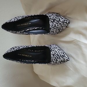 Black and white heels with geometric print. Size 8.5 M